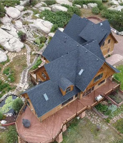 Clear, high-angle drone shot of a completed roof, with great lighting and angle
